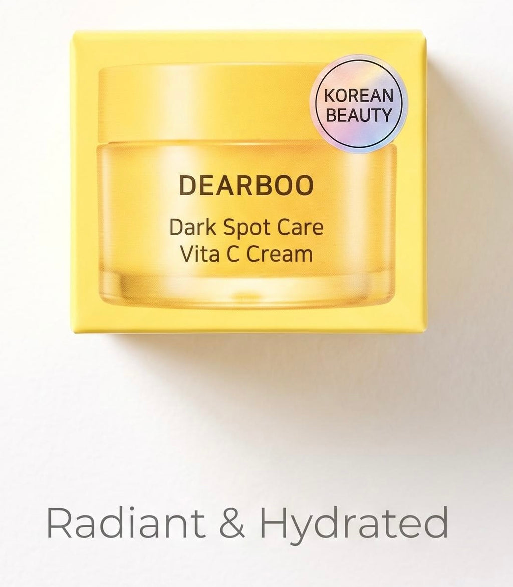 A yellow DEARBOO skincare cream jar with its matching yellow box packaging, featuring a circular 'KOREAN BEAUTY' badge. The text 'Radiant & Hydrated' is written below on a clean white background.