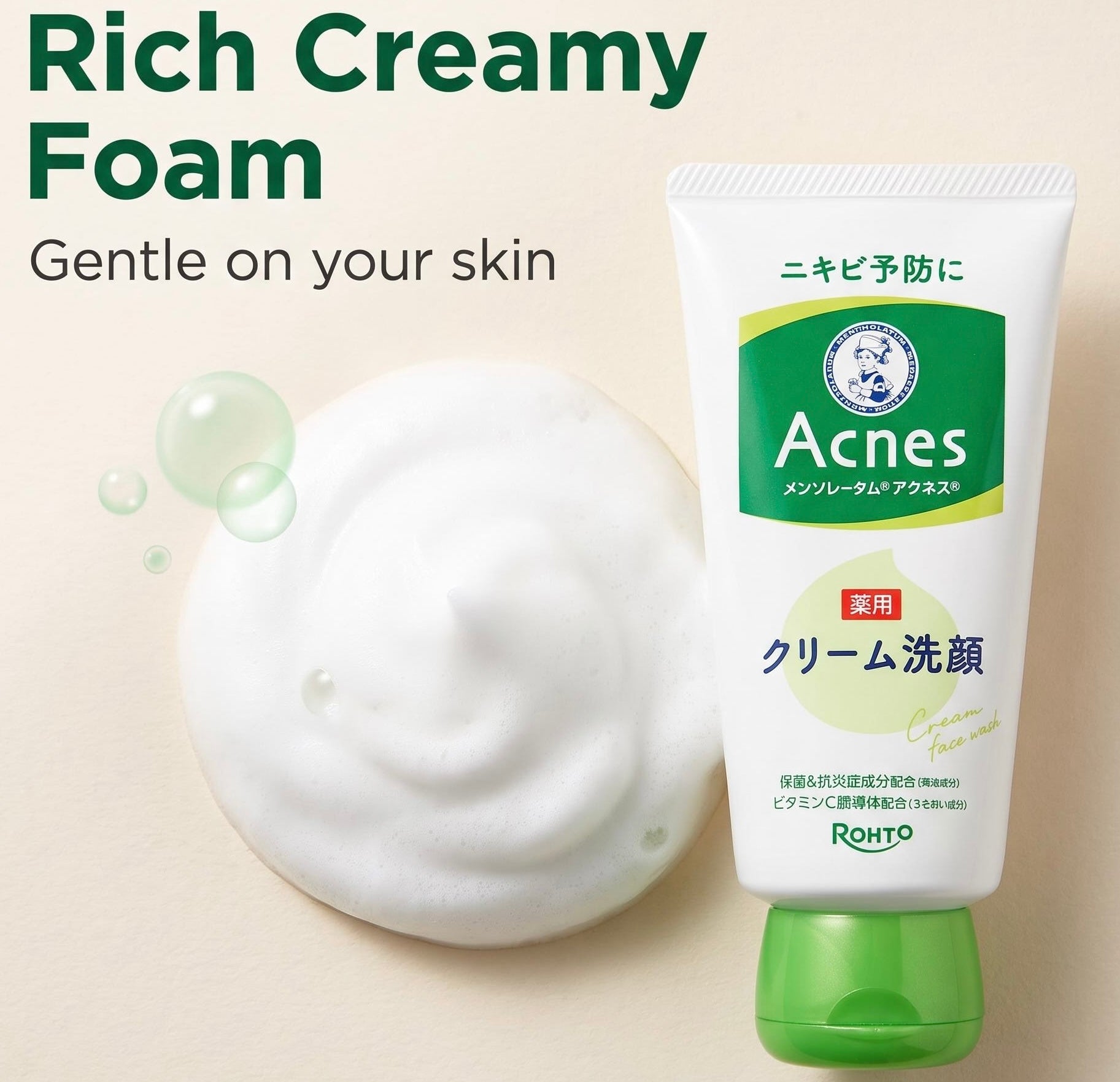 Acnes Cream Cleanser tube by Rohto shown next to a dollop of rich creamy foam on a light beige background with promotional text.