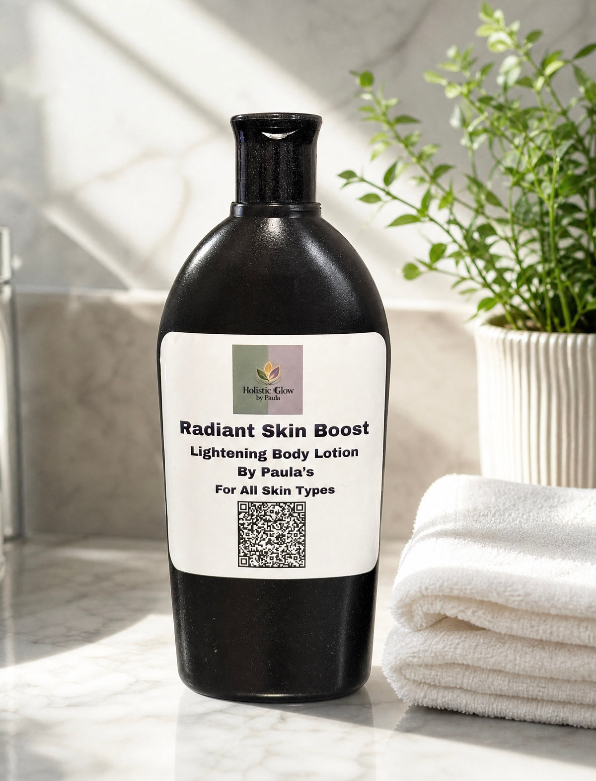 A black bottle of Radiant Skin Boost Lightening Body Lotion by Paula's is displayed on a marble countertop next to a folded white towel and a potted green plant.