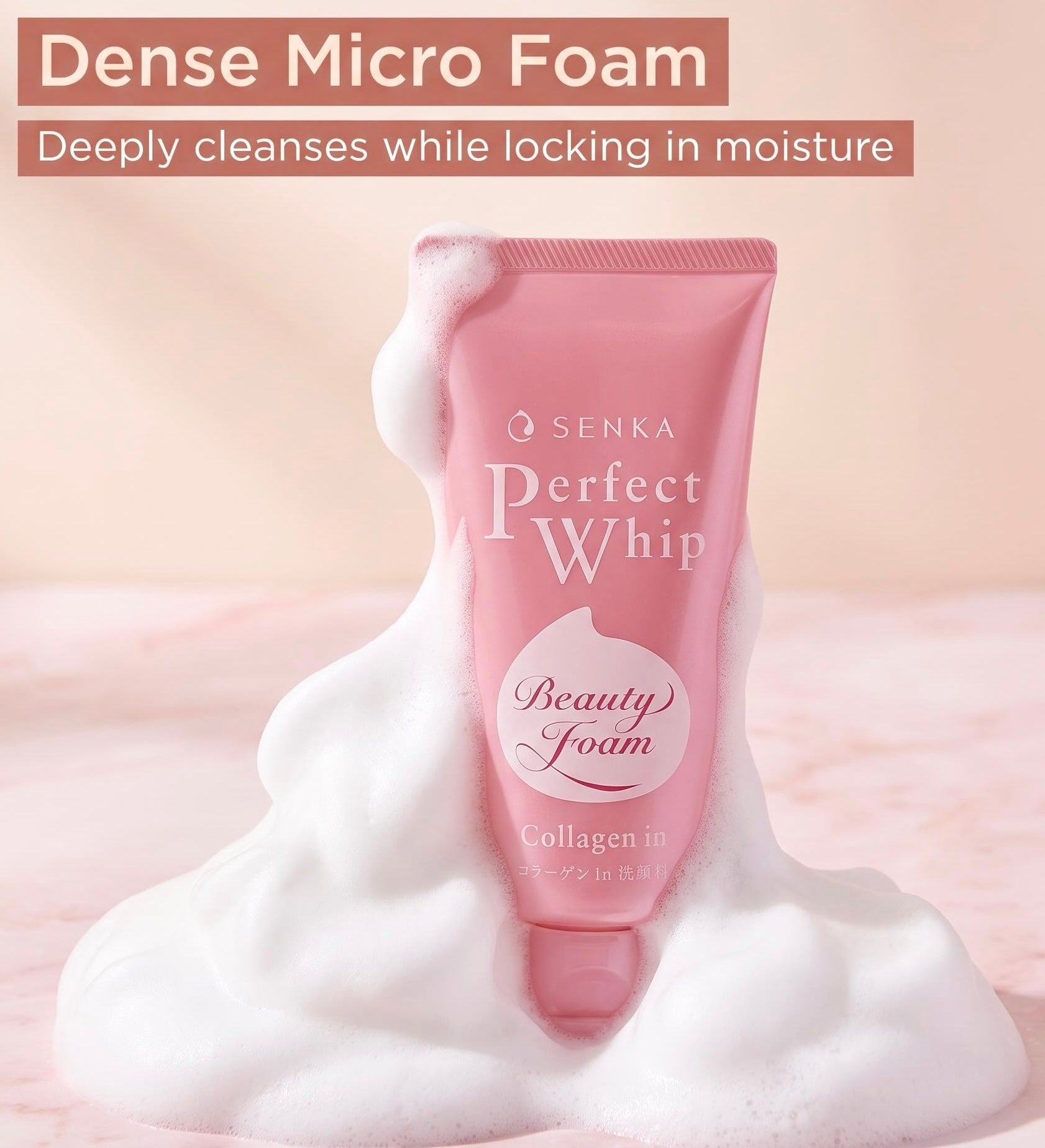 A pink tube of Senka Perfect Whip Beauty Foam stands upright in a pool of thick white foam against a soft peach-pink background. Text at the top reads 'Dense Micro Foam' and 'Deeply cleanses while locking in moisture.