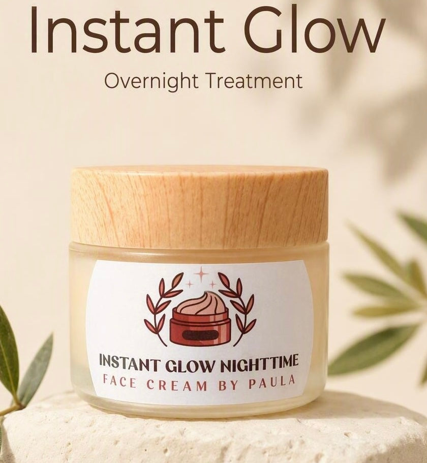 A jar of face cream labeled 'Instant Glow Nighttime Face Cream by Paula' with a light wood lid, set on a stone surface with soft leaf shadows and the text 'Instant Glow Overnight Treatment' above it.