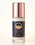 A bottle of Paula's Brighten Up Underarms Deodorant Serum with a metallic rose gold cap and a navy blue label, shown on a clean white background.