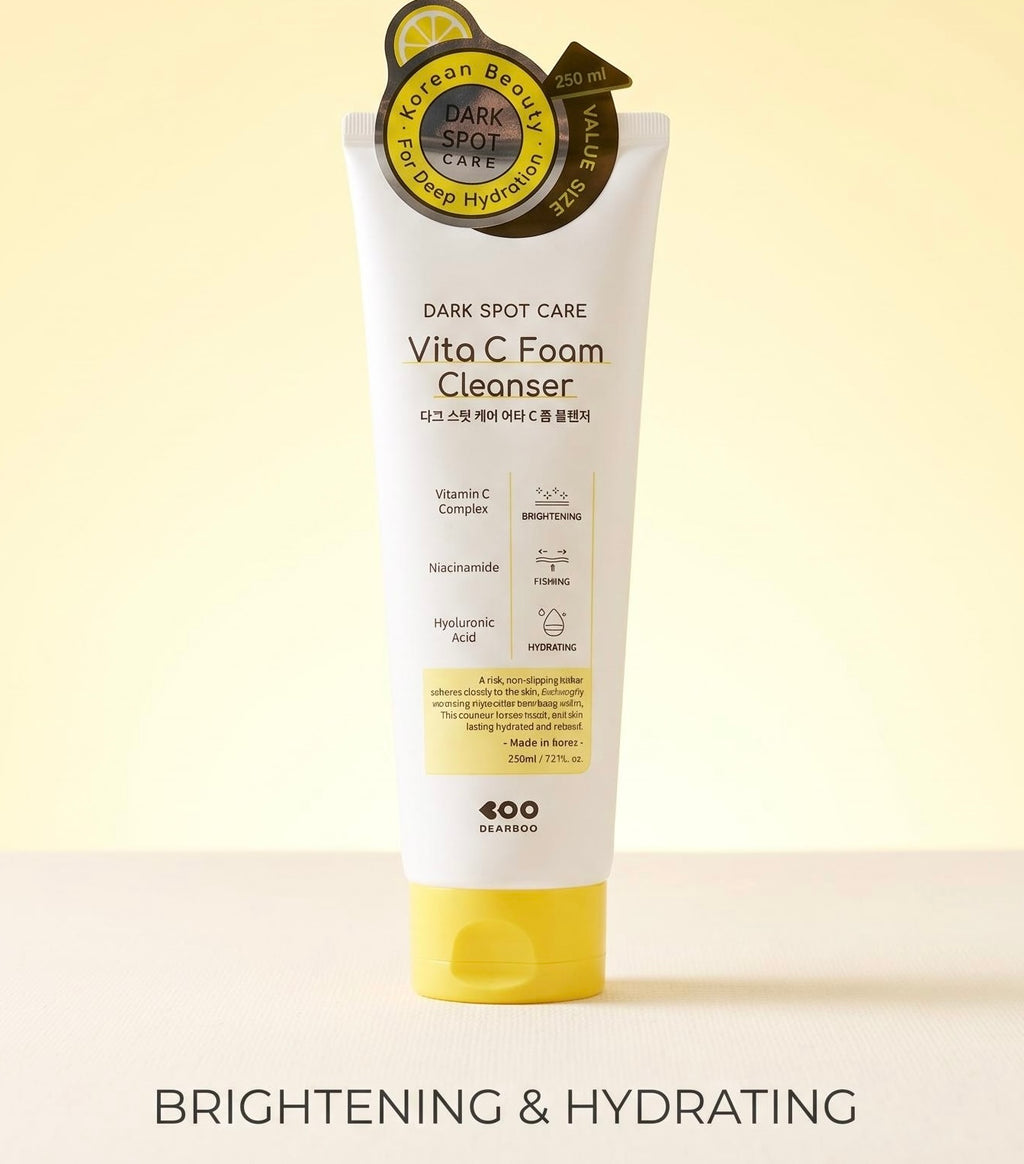 A tube of 400 by e-MOON Vita C Foam Cleanser with dark spot care, featuring a white tube with a yellow cap, set against a soft yellow background with the text 'BRIGHTENING & HYDRATING' at the bottom.