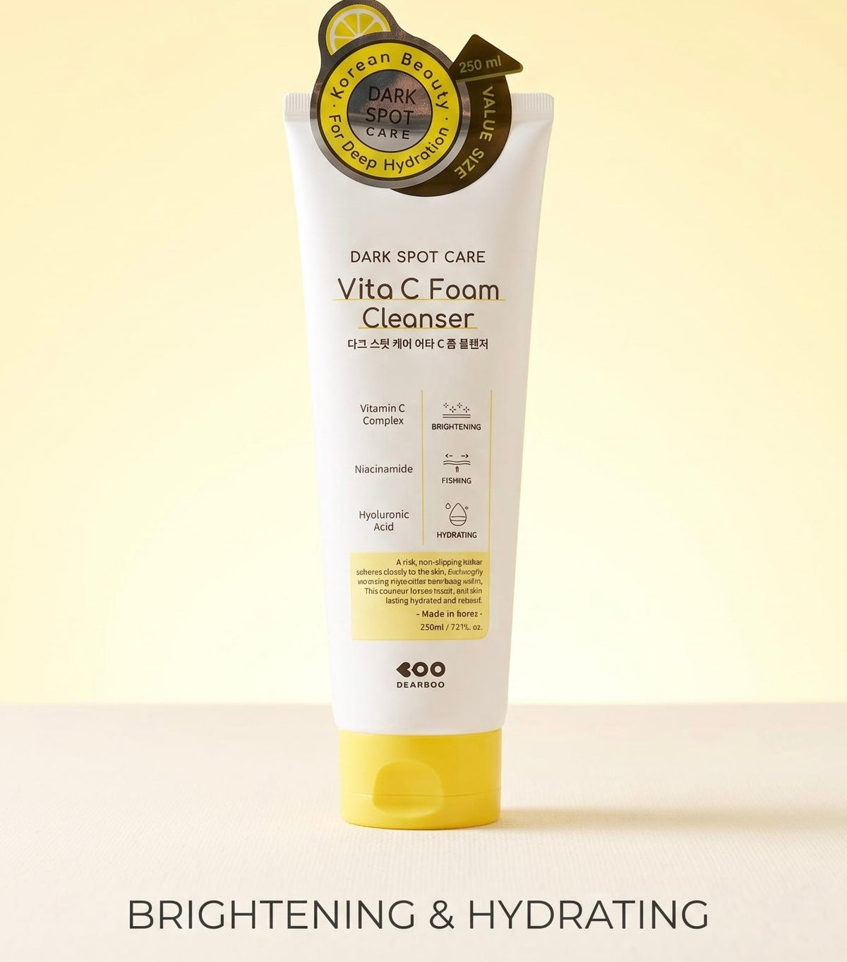 A tube of 400 by e-MOON Vita C Foam Cleanser with dark spot care, featuring a white tube with a yellow cap, set against a soft yellow background with the text 'BRIGHTENING & HYDRATING' at the bottom.